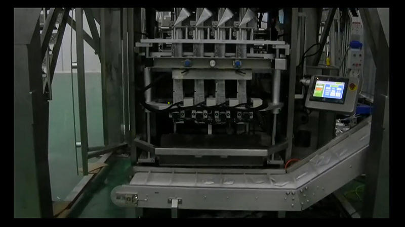VL80 with 4 heads auger filler and big storage hopper for packing milk powder in customer factory